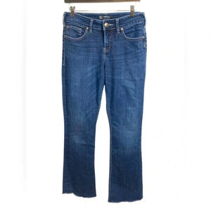 Silver Natsuki mid rise, mid weight, mid wash, boot cut jean w raw hem, 28 by 33